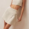 Chari Mini Falda Beige